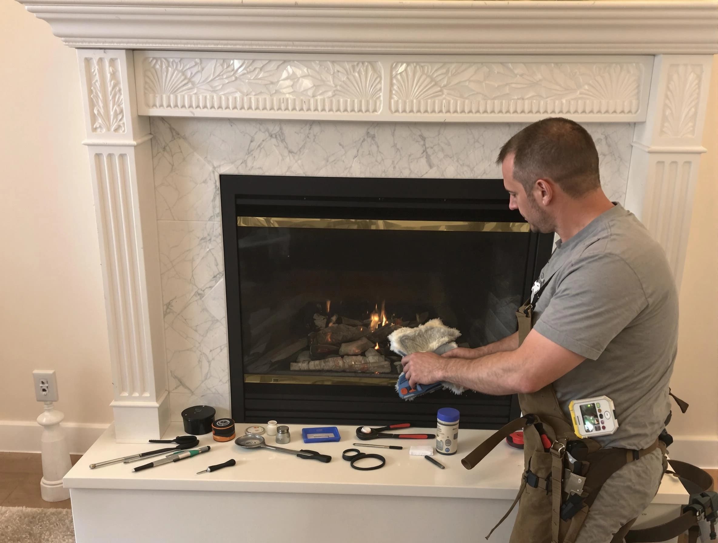 Edgewater Chimney Sweep performing fireplace maintenance in Edgewater, CO